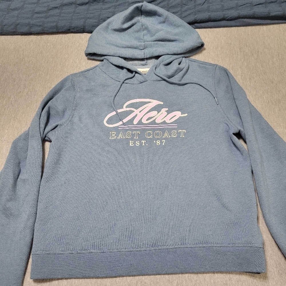 Aero Blue Hoodie with Pink and White Logo
